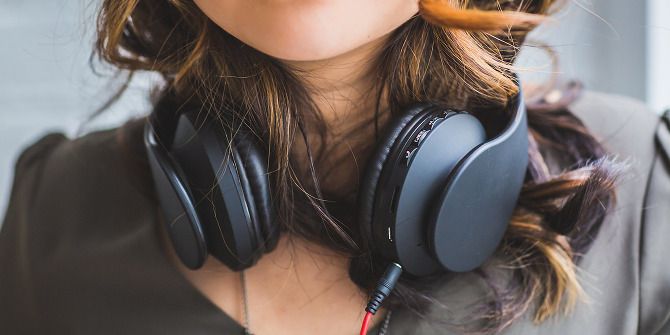 Here's Why Your Headphones Keep Breaking (And What You Can Do) headphones around neck