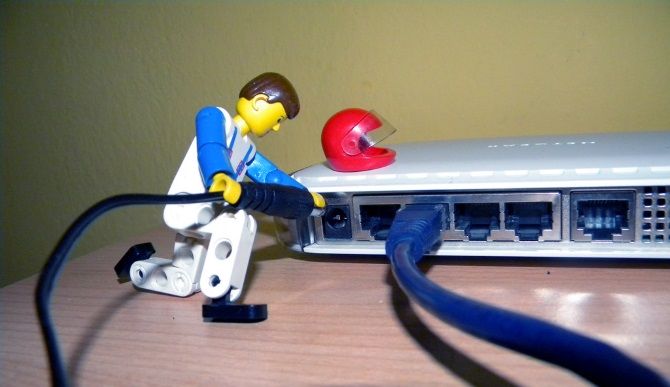 LEGO man working on router