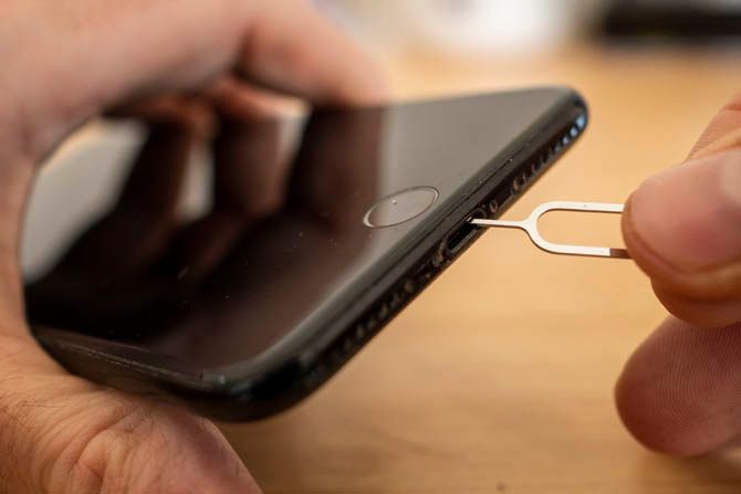 Cleaning an iPhone Charging Port with SIM Key