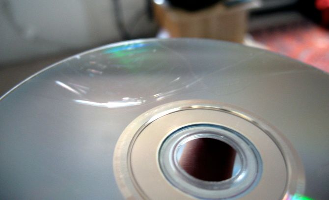 Can a scratched DVD be fixed with toothpaste?